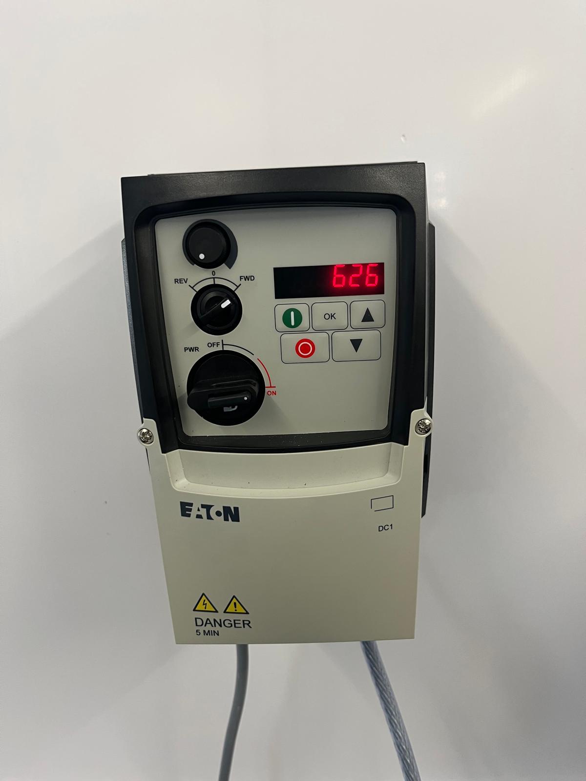 Eaton variable frequency drive display for calibrated motor speed on mixing and transfer equipment.
