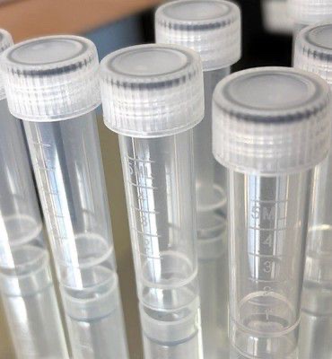 Lab-style small-format bottle and vessel handling.
